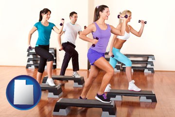 an exercise class at a gym - with Utah icon