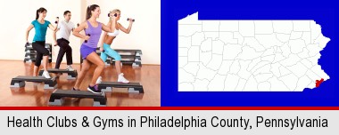 an exercise class at a gym; Philadelphia County highlighted in red on a map